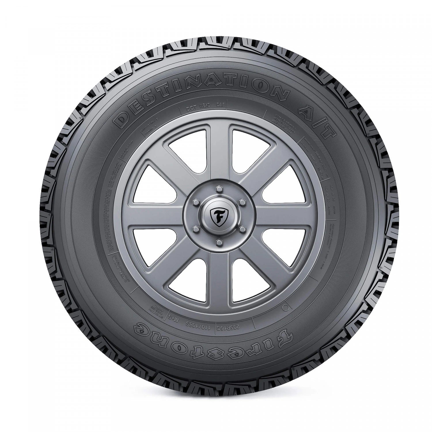 Firestone Destination A/T montado en pickup en camino de tierra